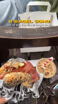Delicious bagel with Dirty Breakfast and iced coffee from B Bagel Bakery in Soho, perfect for a London morning!