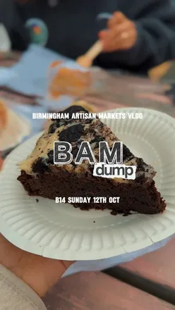 Attendees enjoying vibrant market stalls at Birmingham Artisan Markets with local traders and autumn vibes.