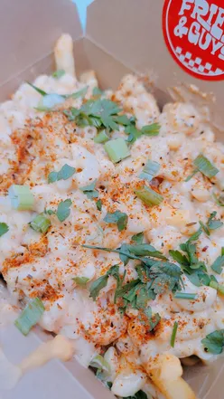 Loaded fries with creamy mac & cheese, crispy chicken, and desserts at Fries & Guys in Manchester, a foodie paradise! 🍟✨