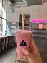 Enjoying a Serrano sandwich and Stress Down smoothie at Joe & The Juice on Cannon Street, London.