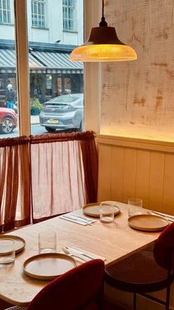 Interior of Berut Bistro in Marylebone, showcasing warm decor and inviting ambiance for Lebanese dining.