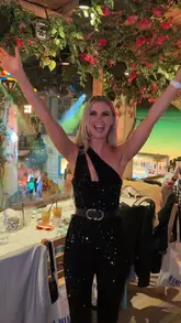 Dining at Mamma Mia Party in London, enjoying a vibrant atmosphere and delicious food.