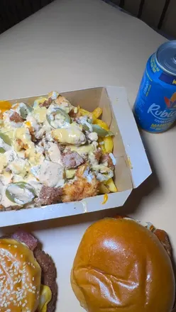 Delicious Ghost Stack burgers and loaded fries at Ardwick, Manchester's hottest burger spot.