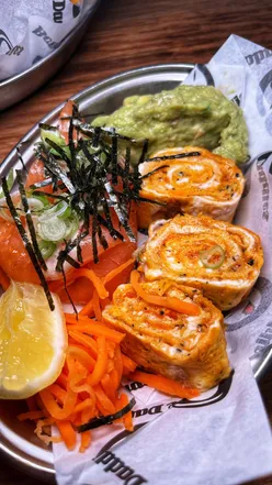 Breakfast menu at Bone Daddies Victoria featuring ramen, spam fries, bao bun, and tamagoyaki.