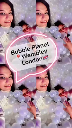 Visitors enjoying immersive experiences at Bubble Planet Experience in London, featuring colorful rooms and balloon simulator.