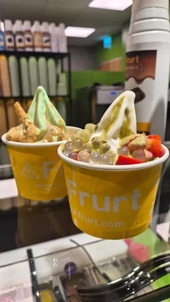 Delicious froyo toppings at Frurt's launch event in Preston, featuring mint and white chocolate flavors with various toppings.