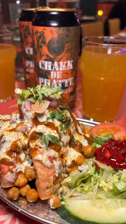 Delicious Punjabi dishes and mango lassi pale ale at The Pakora Bar, recommended by friendly staff. 🌟9/10