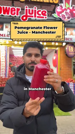 New Pomegranate Flower Juice shop in Manchester offering refreshing pomegranate juice drinks on Wilmslow Road.