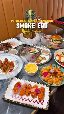 Tempura prawns and Wagyu beef burger at Smoke End, London's top halal steakhouse in a chic setting.