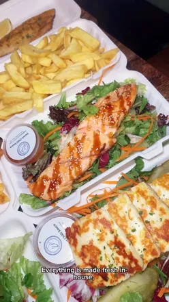 Delicious fish and chips served at Brockley's Rock, an award-winning London takeaway with fresh, homemade options.