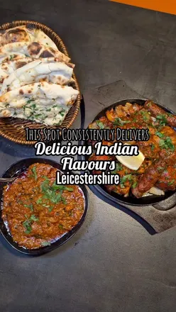 Delicious Indian dishes including sev puri, lamb curry, and sizzler at Indian Rooster Restaurant in Leicester.