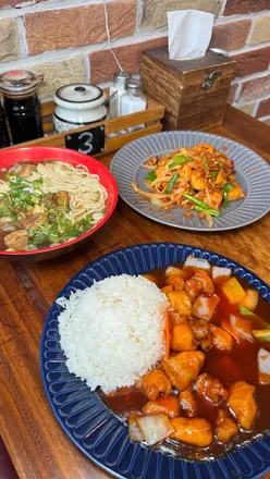Delicious fresh noodles and dumplings at an authentic Asian restaurant in Glasgow, showcasing unique flavors and a cozy atmosphere.