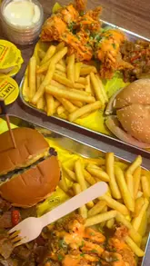 Delicious Munch Boxes featuring burgers, tenders, fries, and coolers at Mr T's, Birmingham 🥭💙 #bhamfood #foodporn