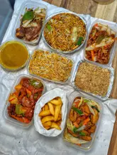 Feast of delicious Chinese dishes including honey chilli chicken, crispy beef, and Peking chicken at Wing Chau, North Shields.
