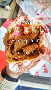 Delicious vegan doner kebab with spiced vegan meat, fresh salad, and chili sauce at Great British Doner, Manchester.
