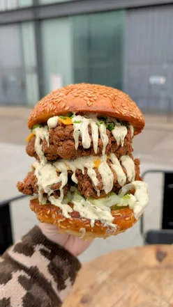 Delicious chicken burger served at Gurt Wings in Bristol, known for their famous wings and mouthwatering dishes.