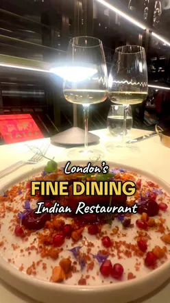 Couple enjoying a romantic dinner at Vatavaran, a fine dining Indian restaurant in Knightsbridge, London.