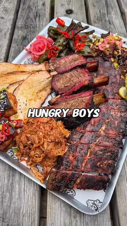 BBQ tray featuring smoked meat at Hungry Boys in Farnham, showcasing Dean's self-taught culinary skills. #bbq #foodreview