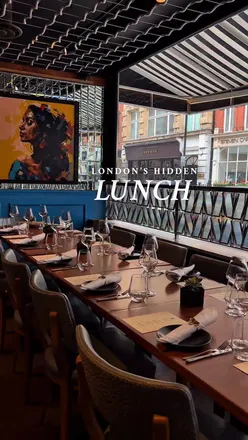 Group enjoying Diwali lunch with achari paneer tikka and jackfruit kofte at Kanishka, Mayfair, London.
