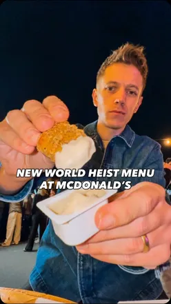 Enjoying the new McDonald's World Heist menu at the London pop-up event with friends.