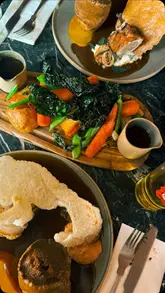Delicious roast dinner at Lion and Lobster in Brighton, featuring a deluxe roast and a giant hash brown starter.
