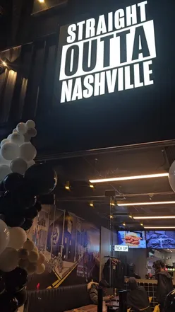 Delicious Nashville box meal with burgers, loaded fries, and shakes at Straight Outta Nashville in Dalston, London.