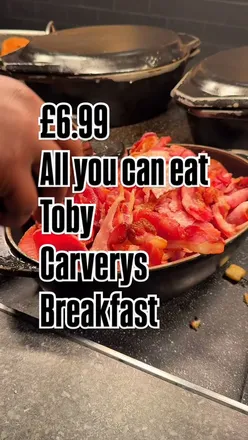 Patrons enjoying comfort food at Toby Carvery, reflecting on their surprising love for the restaurant despite its quiet vibe.