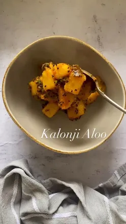 Delicious Kalonji Aloo, a spiced potato dish, showcasing the versatility of potatoes in Indian cuisine.