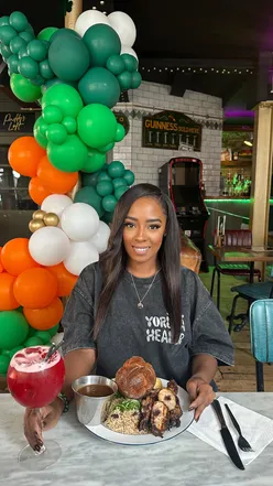 Delicious Caribbean Sunday roast with jerk chicken, rice & peas, and Yorkshire pudding at Paddy’s Yard in Brixton.