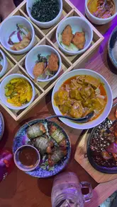 Dining at Zan Asian in Leeds City Centre, enjoying Malaysian curries and stir-fried noodles in a cozy atmosphere.