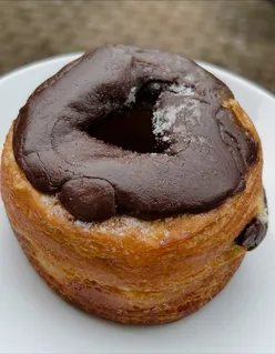 Crispy cronut filled with chocolate, served at Little Larder, perfect for dessert lovers in London.