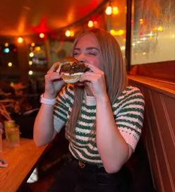 “Delicious buttermilk chicken and smoky bro burgers with fries and pickles at Three Brothers Burgers, Bristol.”