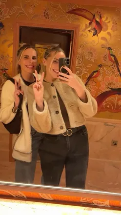 Friends enjoying a chic meal with steak tartare and desserts at The Ivy in Nottingham's stylish setting.