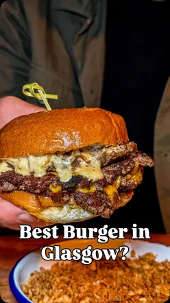 Delicious burger and loaded fries with unique toppings at Smokey Trotters Kitchen in Glasgow East End.