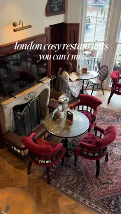 Cozy interior at The Hound, Chiswick, featuring a delicious lamb roast dinner for a rainy Sunday feast.