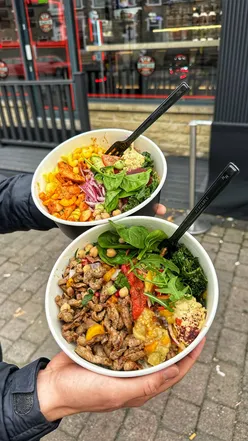 Healthy meal at Gym Kitchen Cafe featuring protein-rich dishes in a vibrant gym setting.