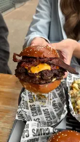 Delicious burgers from @cawsburger in Hitchin, featuring ham jam and chorizo jam favorites.