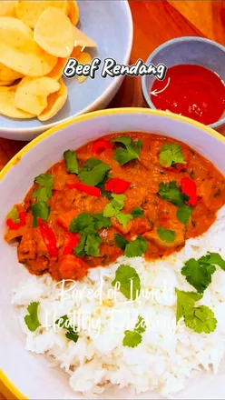 Delicious Chicken Meatball Korma and Beef Rendang from 'Bored of Lunch' cookbook, showcasing healthy and flavorful dishes.