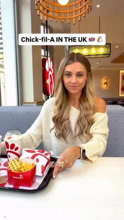 Chick-fil-A opening in Leeds, UK, with excited guests outside the new location on Commercial Street.