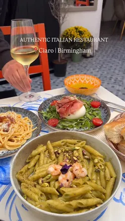 Delicious Italian dishes at Ciaro in Birmingham: burrata, focaccia, carbonara, and pesto by the scenic Gas Street Basin.