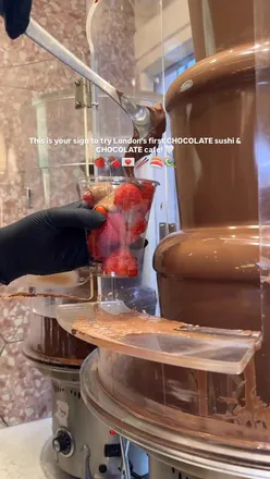 “Chocolate sushi and desserts at Cocomelt cafe in Oxford Circus, London, featuring matcha and s'mores hot chocolate.”