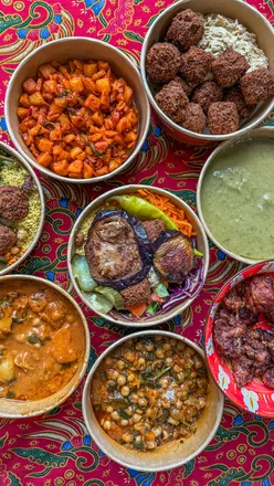 Vegetarian curry and soup dishes from Eat A Pitta, perfect for a winter meal in Bristol's vibrant food scene.