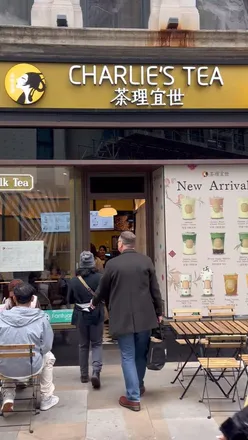 Enjoying Ceylon Black Tea and Brown Sugar Matcha Latte at Charlie's Tea, a popular bubble tea spot in London.