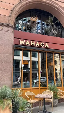 Enjoying a flavorful Birra Torta with dipping broth at Wahaca, Edinburgh, showcasing fresh, local ingredients.