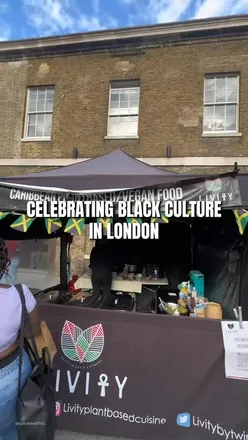 Celebrating Black culture and creativity at a vibrant event in Woolwich, featuring food stalls and local businesses.