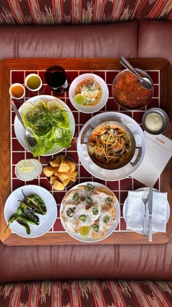 Enjoying vibrant brunch at Decimo on the 10th floor of The Standard London, with views of St Pancras and delicious cocktails.