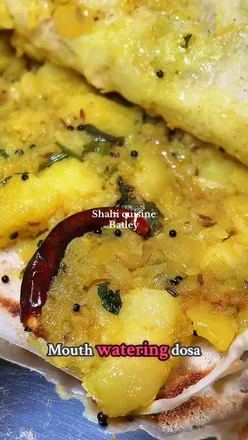 Delicious dosa filled with spiced potatoes at Shahi Cuisine in Batley, perfect for cozy Yorkshire evenings.