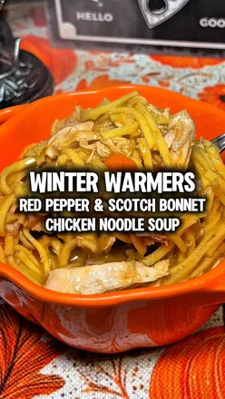 Spicy Red Pepper & Scotch Bonnet Chicken Noodle Soup, perfect for winter warmth and comfort food lovers.