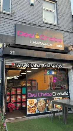 Delicious lamb and butter chicken curry with rotis and paratha at Desi Dhaba in Glasgow, a flavorful dining experience.