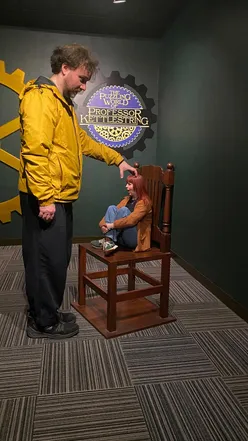 Visitors enjoying mind-bending illusions at Professor Kettlestring’s immersive experience in York, Merchantgate.